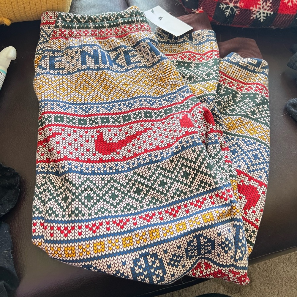 Kids XL Nike joggers 23’ holiday pattern NTW